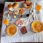 Couette-café Hk Is A Cozy And Welcoming House In The Heart Of It Offers Comfortable Accommodation,free Public Parking Nearby,and Breakfast Included,ensuring A Peaceful And Relaxing For Guests 3*